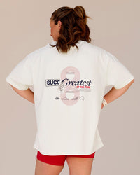 Woman wearing Greatest of All Time Heavyweight FLXCotton Oversized Tee - Off White Washed-Scarlet | Model:Tia | Size:S | Thumbnail Index: 5