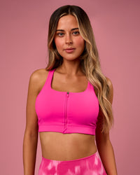 Woman wearing Empowered Sports Bra - Ultra Pink | Model:Tianah | Size:S | Thumbnail Index: 0