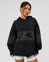 Woman wearing A-Team Oversized Hoodie - Caviar-Onyx | Model:Bianca | Size:XS | Thumbnail Index: 5