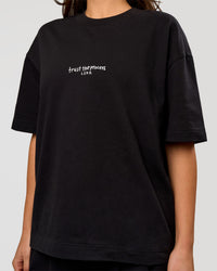 Woman wearing Andrew J. Steel x LSKD Heavyweight Boxed Tee - Black | Model:Bianca | Size:XS | Thumbnail Index: 4