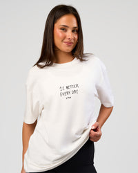 Woman wearing Andrew J. Steel x LSKD Heavyweight FLXCotton Oversized Tee - White | Model:Bianca | Size:XS | Thumbnail Index: 4