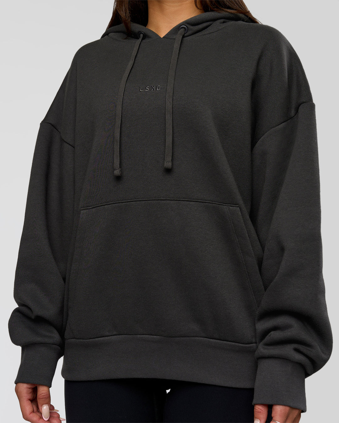 Woman wearing Base Oversized DC Hoodie - Onyx | Model:Bianca | Size:XS - view 14