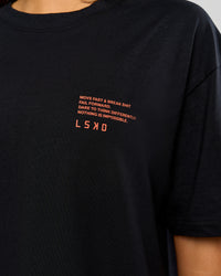 Woman wearing Coffee Run FLXCotton Oversized Tee - Black-Ultra Orange | Model:Bianca | Size:XS | Thumbnail Index: 23