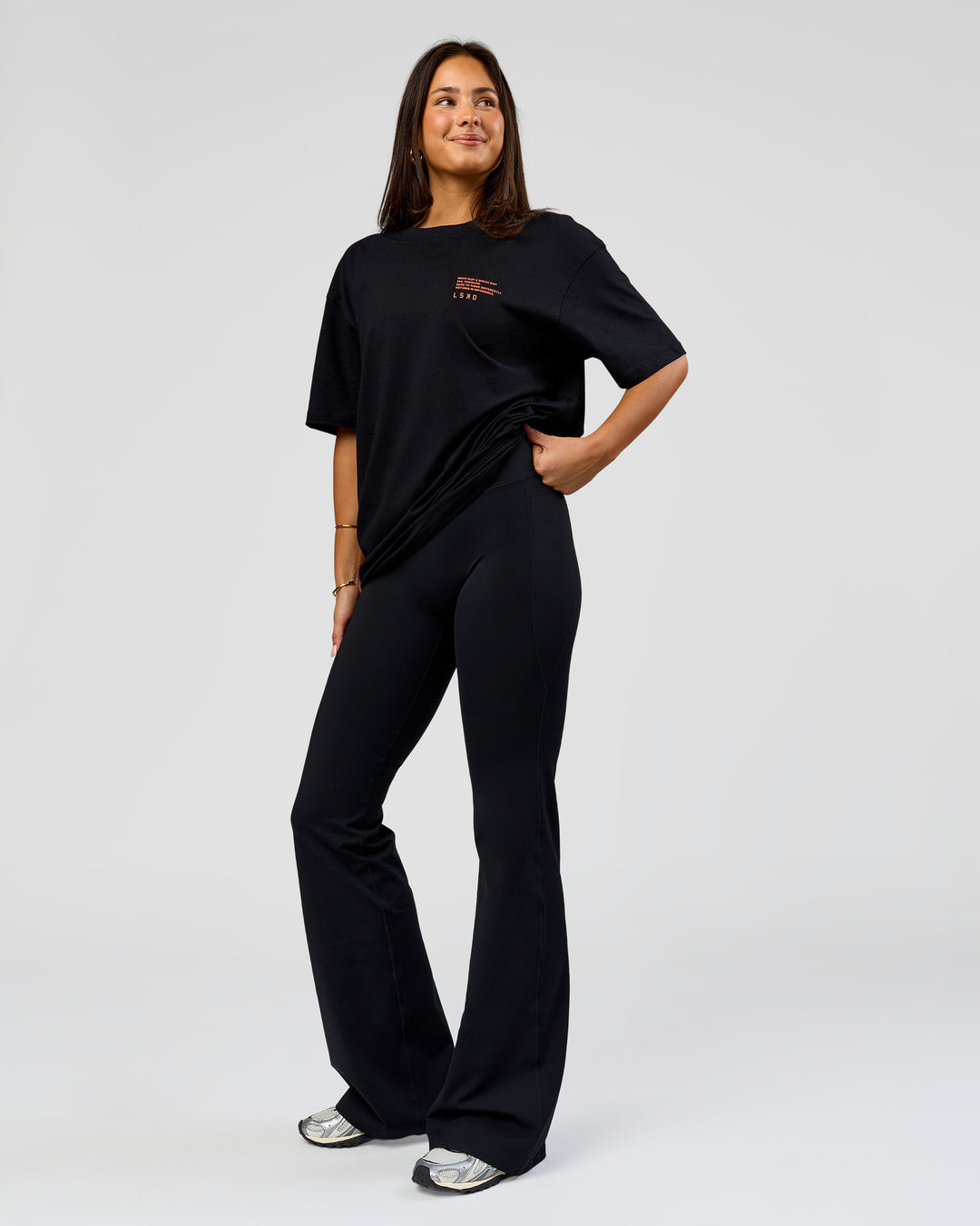 Woman wearing Coffee Run FLXCotton Oversized Tee - Black-Ultra Orange | Model:Bianca | Size:XS - view 7