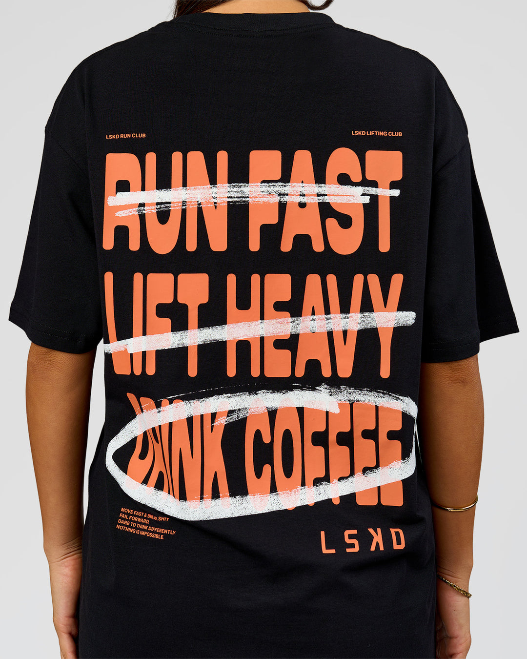 Woman wearing Coffee Run FLXCotton Oversized Tee - Black-Ultra Orange | Model:Bianca | Size:XS - view 9