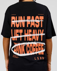 Woman wearing Coffee Run FLXCotton Oversized Tee - Black-Ultra Orange | Model:Bianca | Size:XS | Thumbnail Index: 8