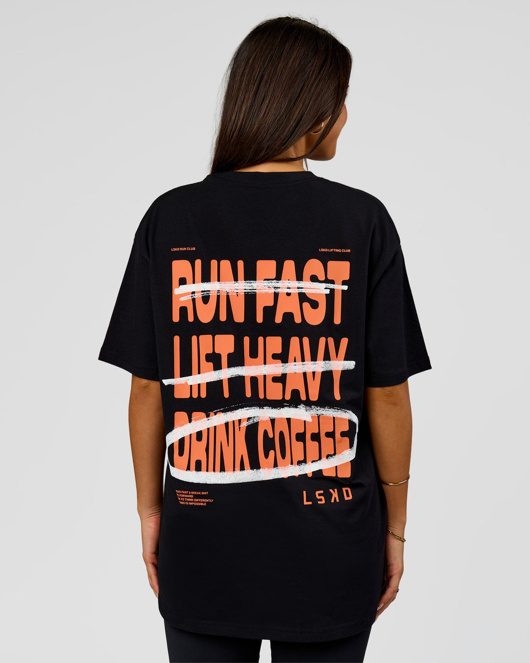 Woman wearing Coffee Run FLXCotton Oversized Tee - Black-Ultra Orange | Model:Bianca | Size:XS - view 12