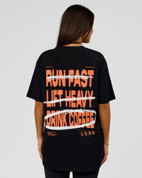 Woman wearing Coffee Run FLXCotton Oversized Tee - Black-Ultra Orange | Model:Bianca | Size:XS | Thumbnail Index: 11