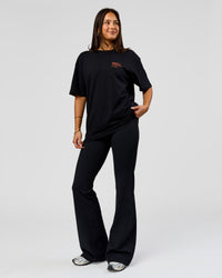 Woman wearing Coffee Run FLXCotton Oversized Tee - Black-Ultra Orange | Model:Bianca | Size:XS | Thumbnail Index: 19