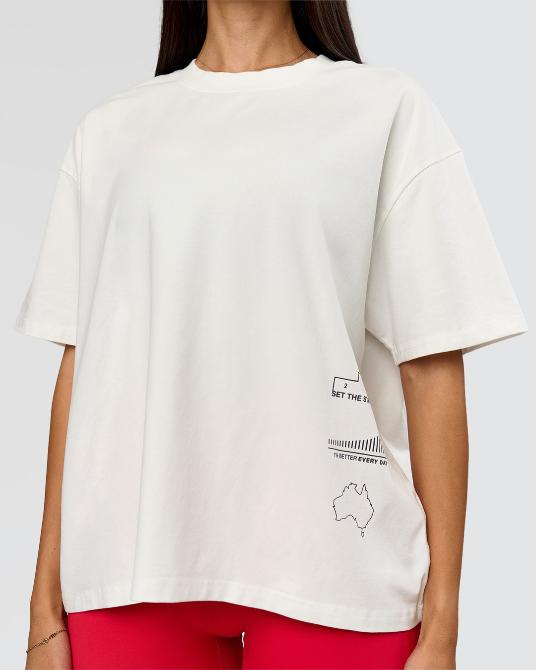 Woman wearing Greatest of All Time Heavyweight FLXCotton Boxed Tee - Off White Washed | Model:Rhiley| Size:XS - view 14
