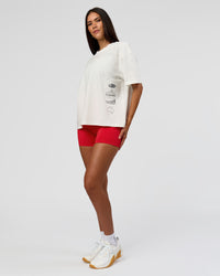Woman wearing Greatest of All Time Heavyweight FLXCotton Boxed Tee - Off White Washed | Model:Rhiley | Size:XS | Thumbnail Index: 15