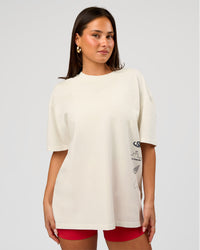 Woman wearing Greatest of All Time Heavyweight FLXCotton Oversized Tee - Off White Washed-Scarlet | Model:Bianca | Size:XS | Thumbnail Index: 9