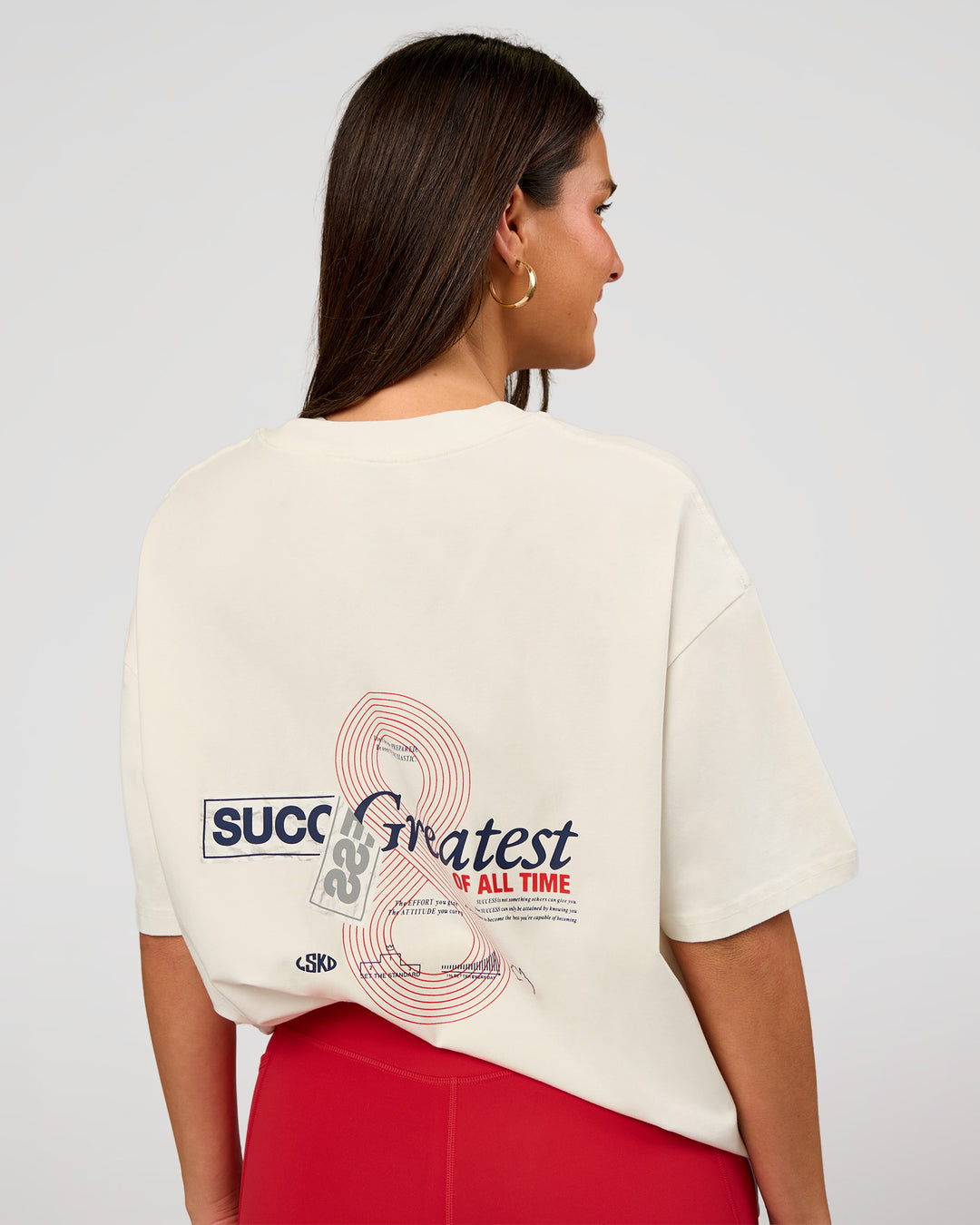 Woman wearing Greatest of All Time Heavyweight FLXCotton Oversized Tee - Off White Washed-Scarlet | Model:Bianca | Size:XS - view 7