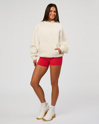 Woman wearing Greatest of All Time Heavyweight Oversized Hoodie - Off White | Model:Bianca | Size:XS | Thumbnail Index: 13