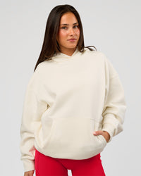 Woman wearing Greatest of All Time Heavyweight Oversized Hoodie - Off White | Model:Bianca | Size:XS | Thumbnail Index: 5