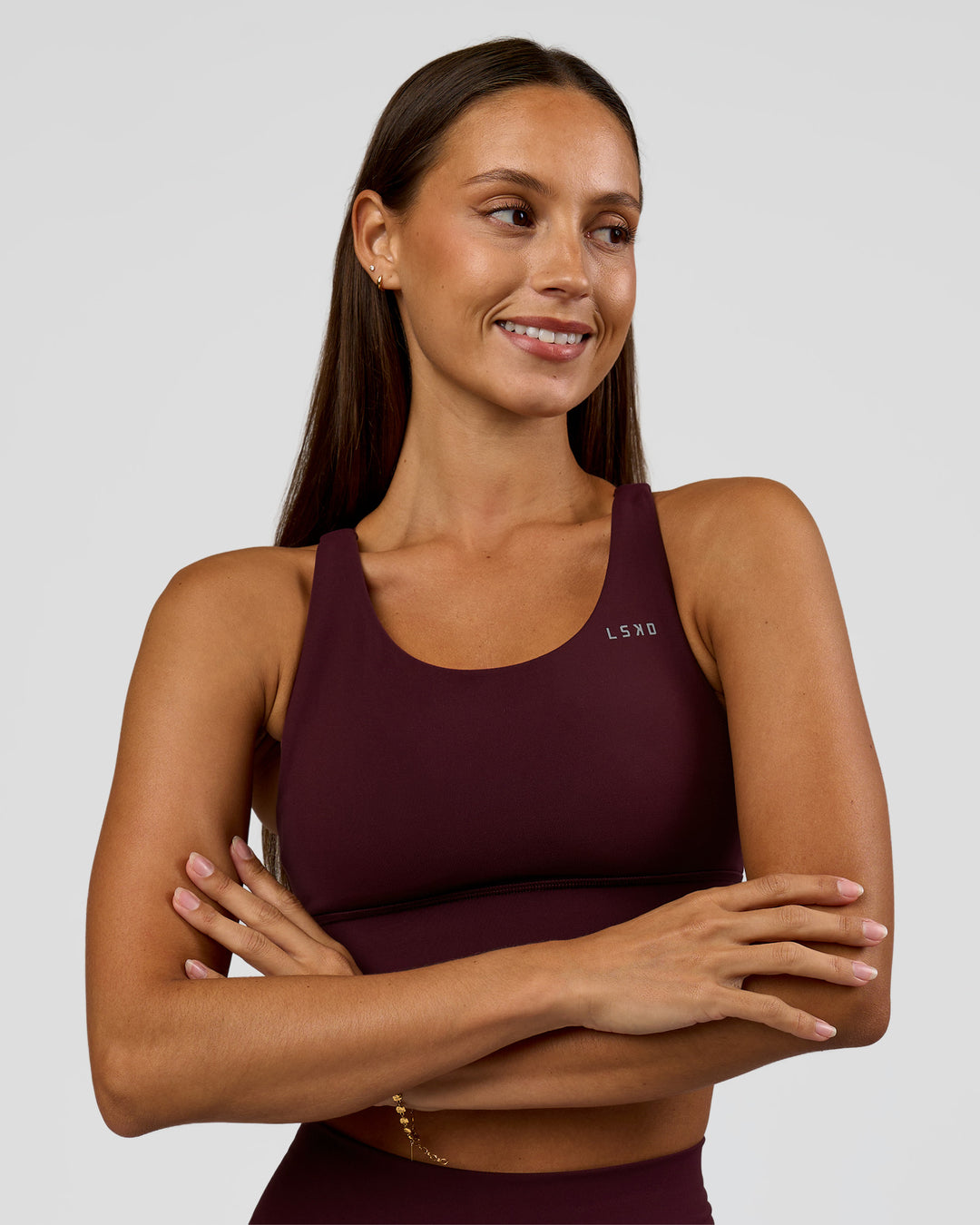Woman wearing Accelerate Sports Bra - Cherry Lacquer | Model:Brylee | Size:XS - view 3
