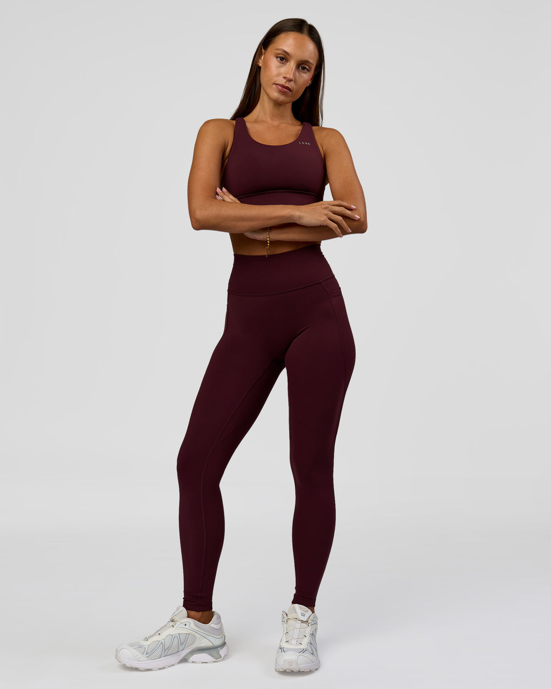Woman wearing Accelerate Sports Bra - Cherry Lacquer | Model:Brylee | Size:XS - view 4