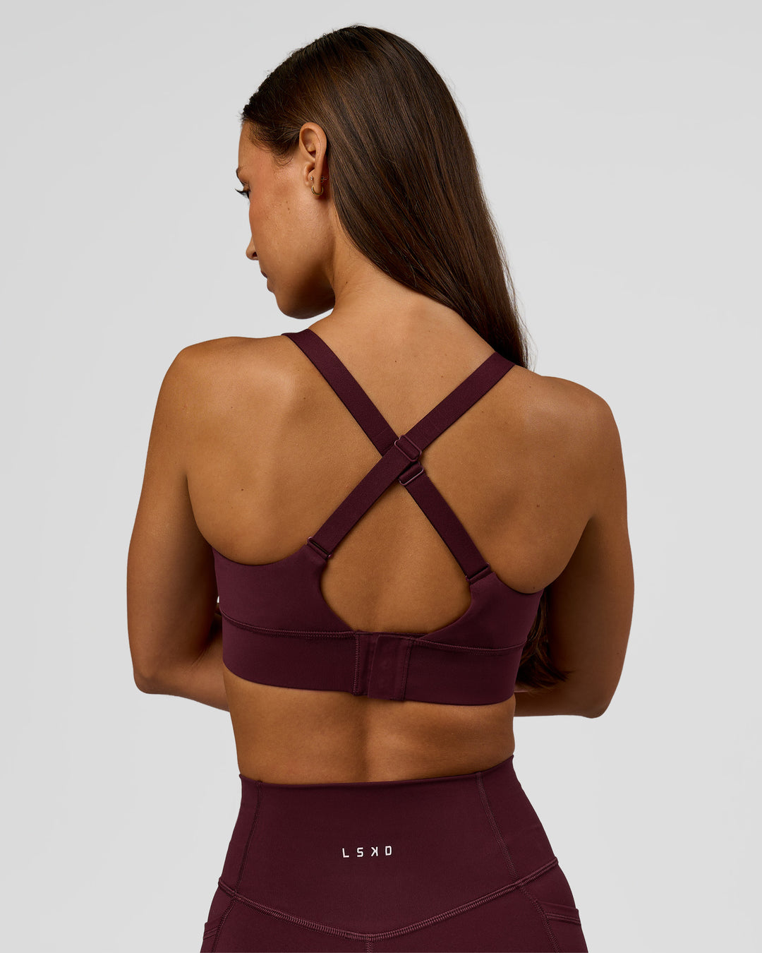 Woman wearing Accelerate Sports Bra - Cherry Lacquer | Model:Brylee | Size:XS - view 7