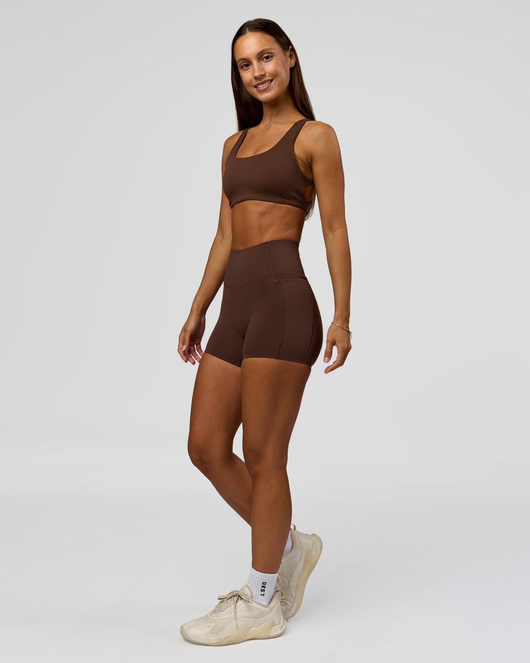 Woman wearing Fusion Bonded High-Rise 4" Short Pockets - Hot Chocolate | Model:Brylee | Size:XS - view 4