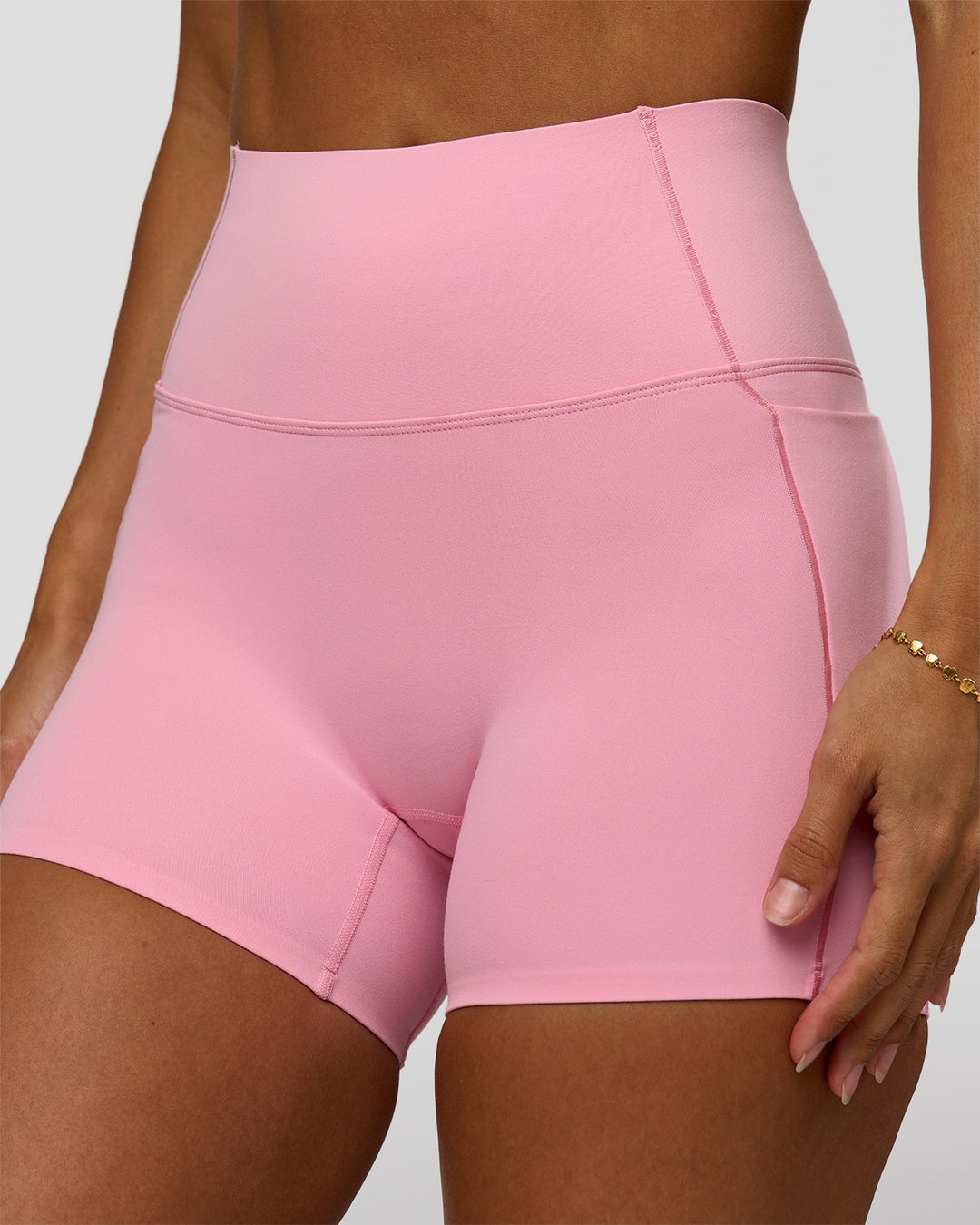 Woman wearing Fusion Bonded High-Rise 4" Short Pockets - Pink Rose | Model:Brylee | Size:XS - view 2