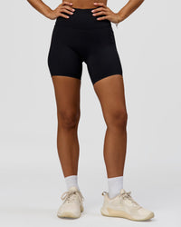 Woman wearing Fusion Bonded High-Rise 6" Short Pockets - Black | Model:Brylee | Size:XS | Thumbnail Index: 6