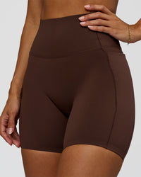 Woman wearing Fusion Bonded High-Rise 6" Short Pockets - Hot Chocolate | Model:Brylee | Size:XS | Thumbnail Index: 0