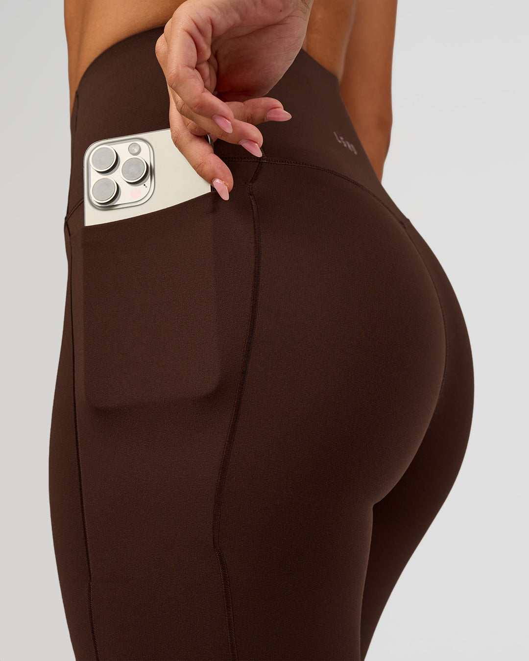Woman wearing Fusion Bonded High-Rise Full Length Legging Pockets - Hot Chocolate | Model:Brylee | Size:XS - view 5