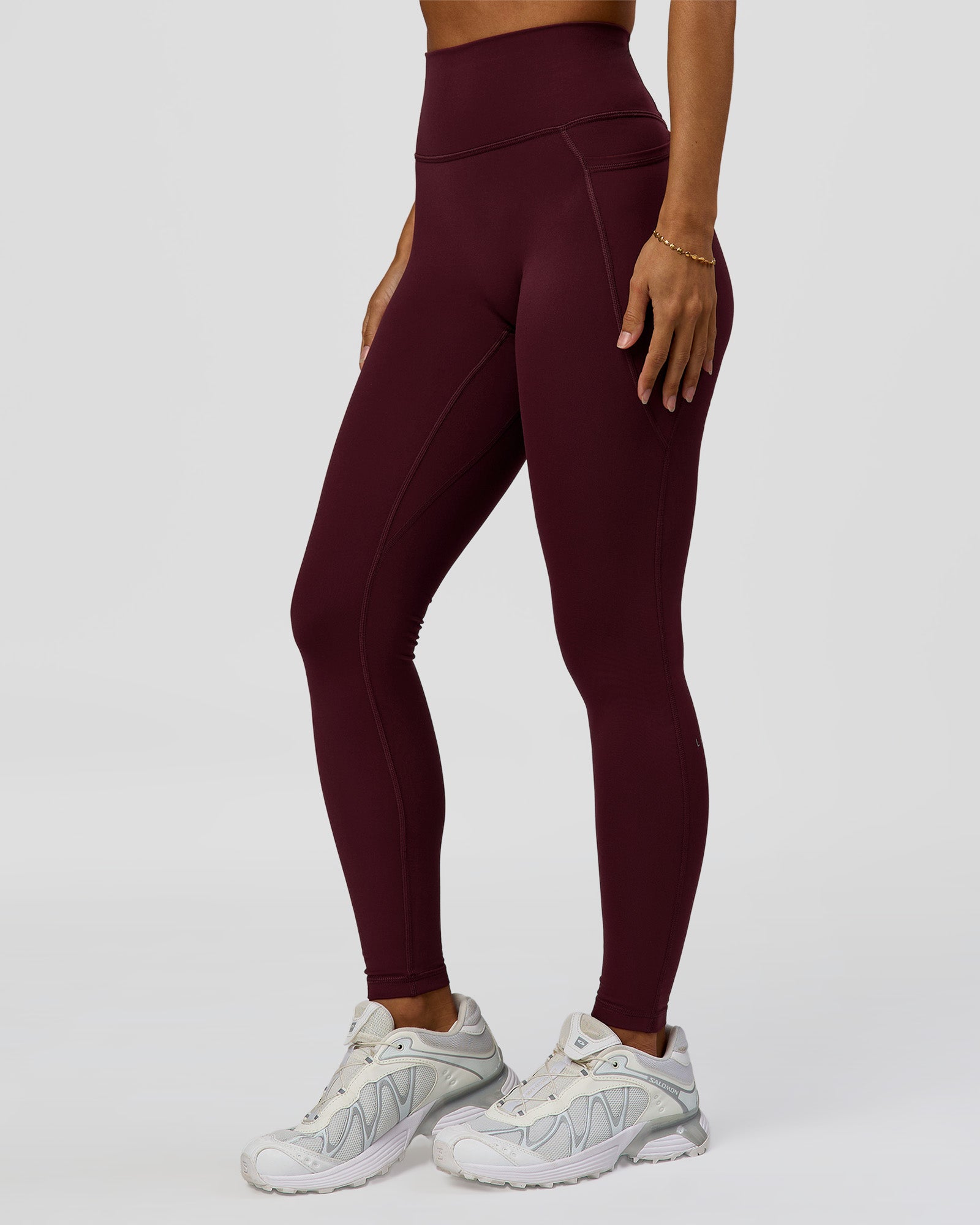 Woman wearing Fusion Ultra High-Rise Full Length Legging Pockets - Cherry Lacquer | Model:Brylee | Size:XS