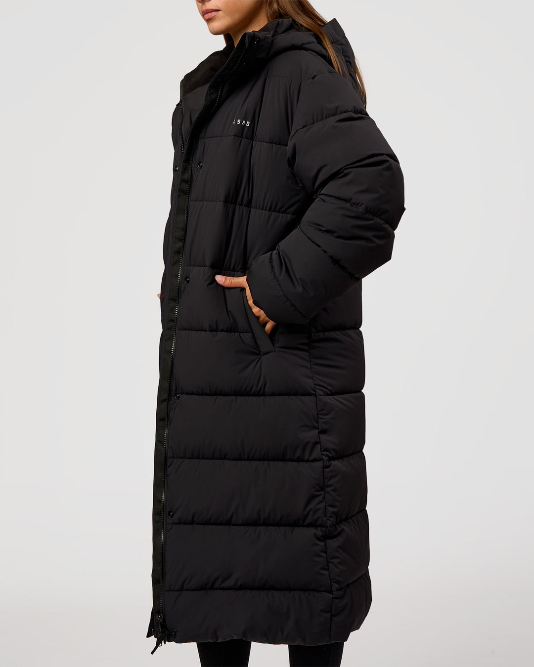 Woman wearing Go-To Puffer Long Jacket - Black | Model:Brylee | Size:XS