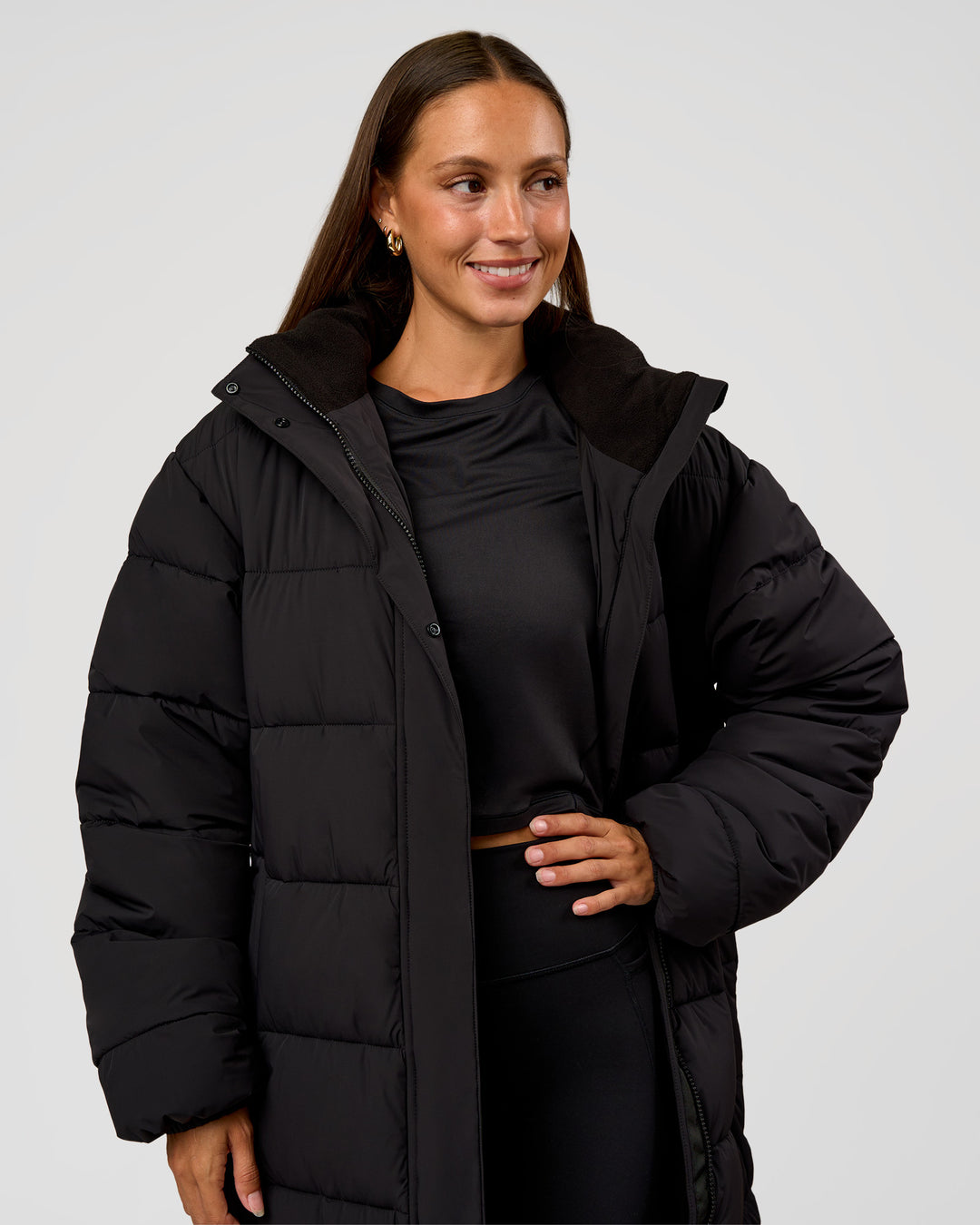 Woman wearing Go-To Puffer Long Jacket - Black | Model:Brylee | Size:XS