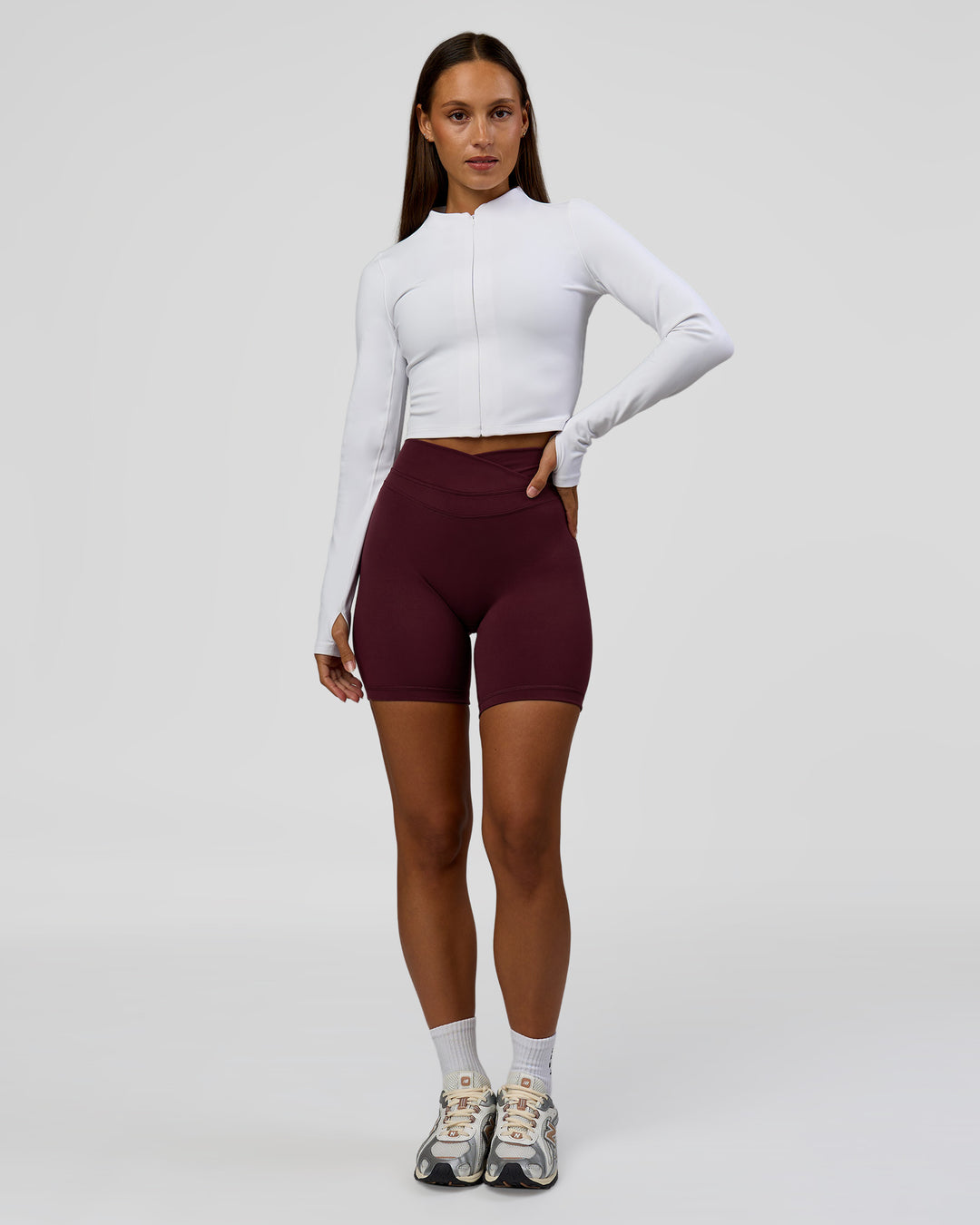 Woman wearing Sculpt Full Zip Long Sleeve Top - White | Model:Brylee | Size:XS - view 6