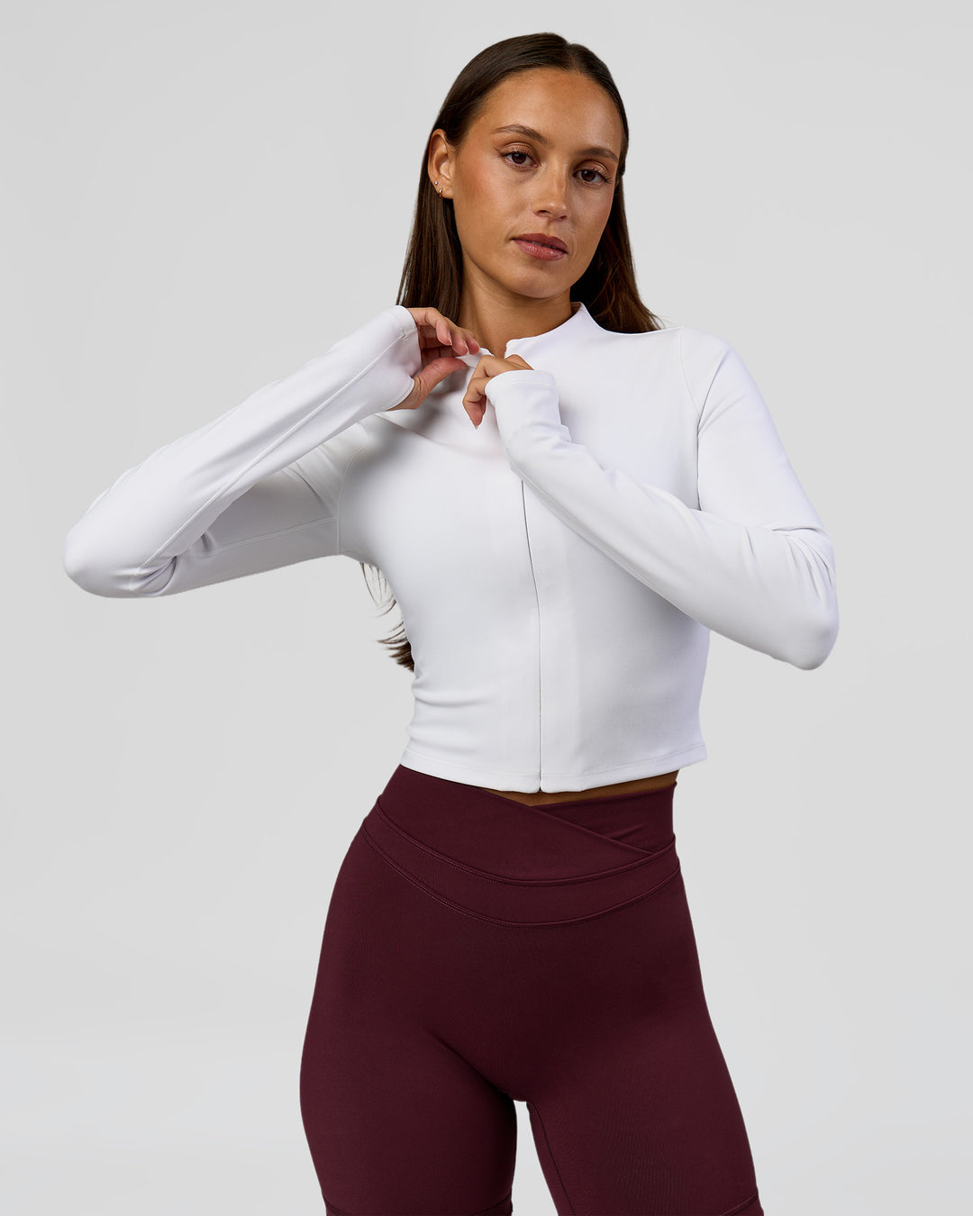 Woman wearing Sculpt Full Zip Long Sleeve Top - White | Model:Brylee | Size:XS - view 1