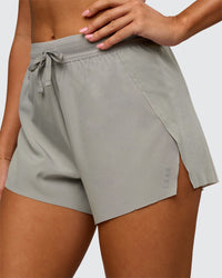 Woman wearing Accelerate 3" High-Rise Running Short - Alloy | Model:Charli | Size:XS | Thumbnail Index: 0