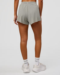 Woman wearing Accelerate 3" High-Rise Running Short - Alloy | Model:Charli | Size:XS | Thumbnail Index: 2