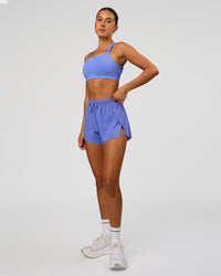 Woman wearing Accelerate 3" High-Rise Running Short - Bluebell | Model:Charli | Size:XS | Thumbnail Index: 1