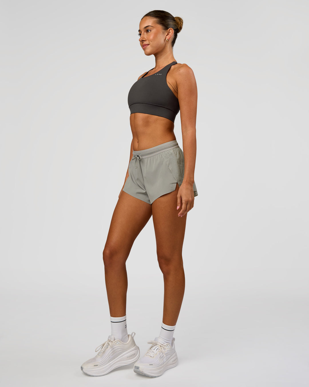 Woman wearing Accelerate 3" Mid-Rise Running Short - Alloy | Model:Charli | Size:XS - view 7