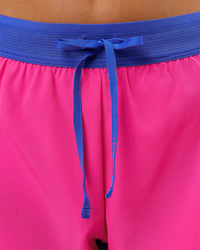 Woman wearing Accelerate 3" Mid-Rise Running Short - Power Cobalt- Ultra Pink | Model:Charli | Size:XS | Thumbnail Index: 4