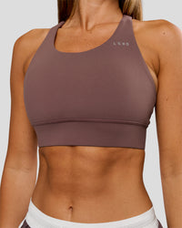 Woman wearing Accelerate Sports Bra - Cocoa Powder | Model:Charli | Size:XS | Thumbnail Index: 0