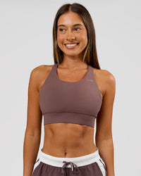 Woman wearing Accelerate Sports Bra - Cocoa Powder | Model:Charli | Size:XS | Thumbnail Index: 1