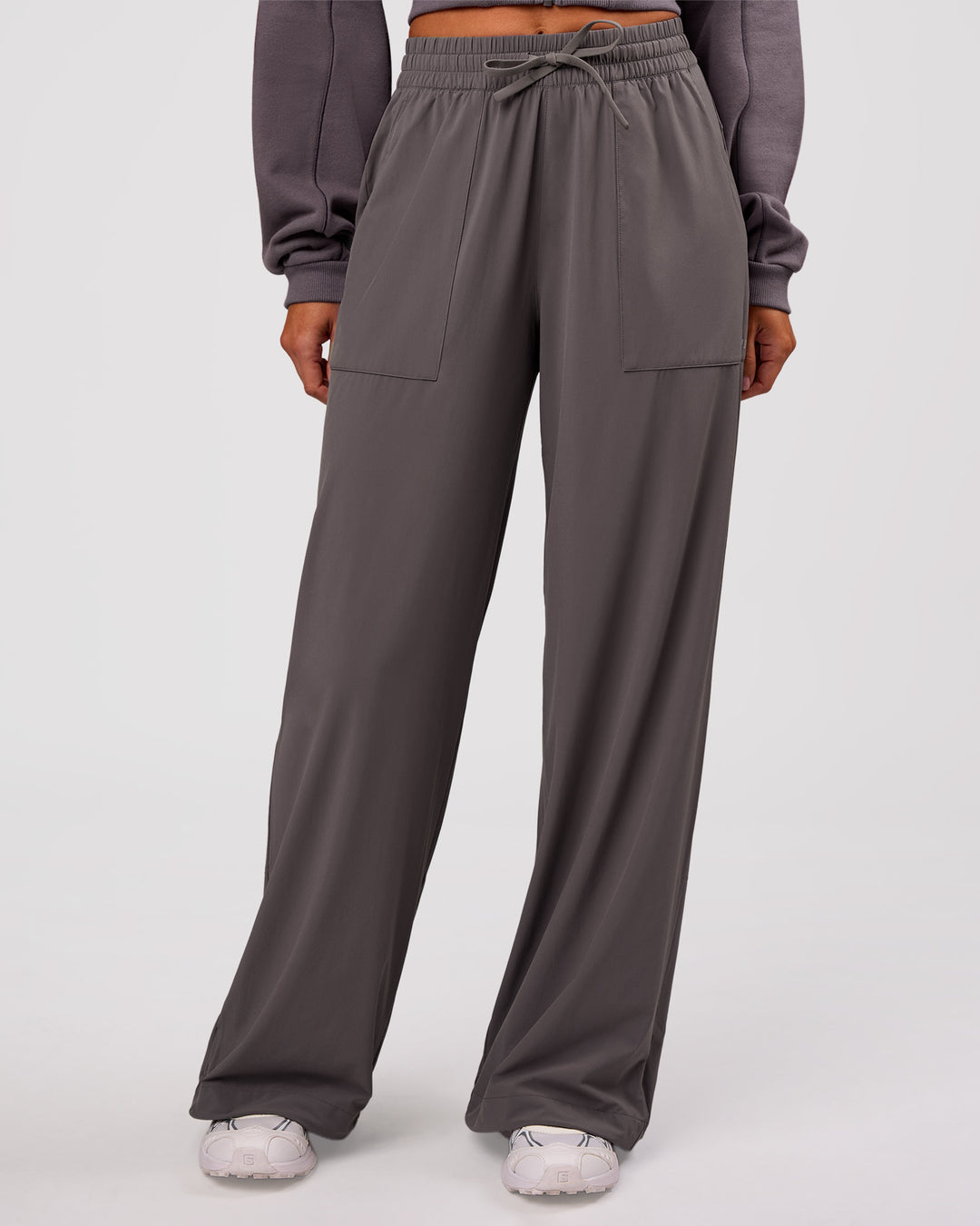Woman wearing Bend Woven Pant - Duskstone | Model:Charli | Size:XS - view 2