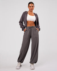 Woman wearing Bend Woven Pant - Duskstone | Model:Charli | Size:XS | Thumbnail Index: 10