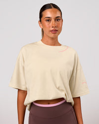 Woman wearing Bree Heavyweight Oversized Tee - Vanilla Bean | Model:Charli | Size:XS | Thumbnail Index: 9