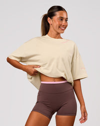 Woman wearing Bree Heavyweight Oversized Tee - Vanilla Bean | Model:Charli | Size:XS | Thumbnail Index: 6