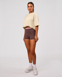 Woman wearing Bree Heavyweight Oversized Tee - Vanilla Bean | Model:Charli | Size:XS | Thumbnail Index: 14