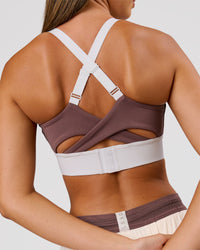 Woman wearing Elevated Accelerate Sports Bra - Cocoa Power-White | Model:Charli | Size:XS | Thumbnail Index: 2