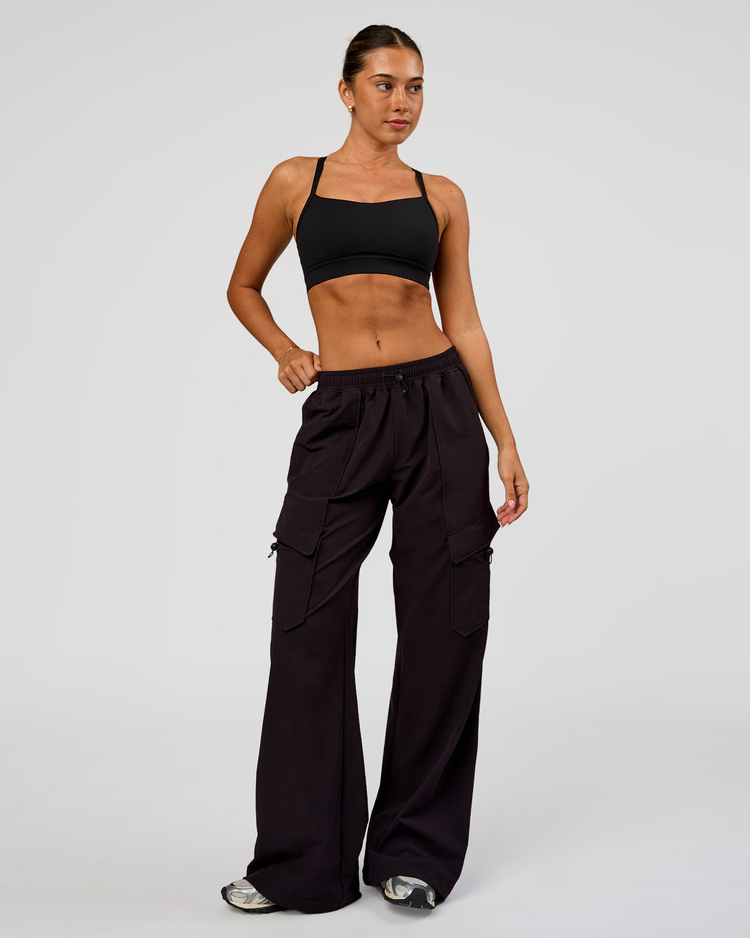 Woman wearing Endeavour Cargo Pant - Black | Model:Charli | Size:XS - view 6