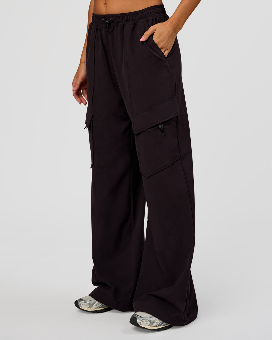 Woman wearing Endeavour Cargo Pant - Black | Model:Charli | Size:XS - view 1