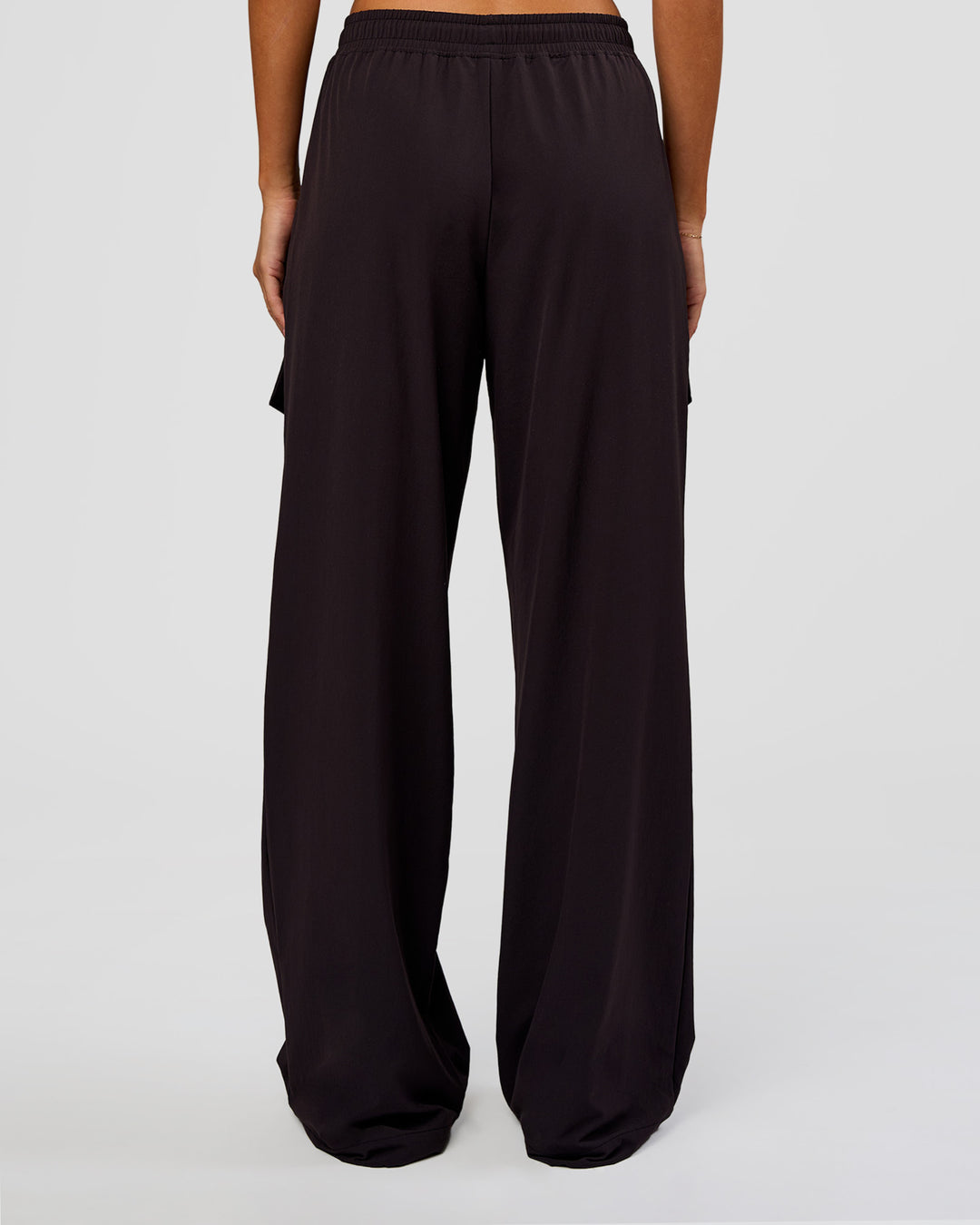 Woman wearing Endeavour Cargo Pant - Black | Model:Charli | Size:XS - view 4