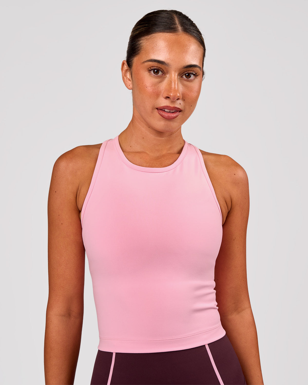 Woman wearing Flow Performance Tank 2.0 - Pink Rose | Model:Charli | Size:XS - view 1