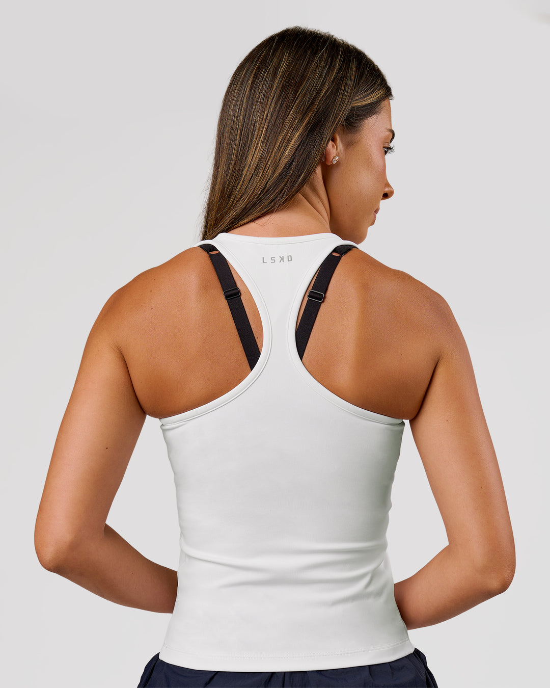 Woman wearing Flow Rep Scoop Neck Tank - White | Model:Charli | Size:XS - view 2